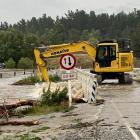 Patearoa township bridge was being cleared of debris this morning after flooding in the Maniototo...