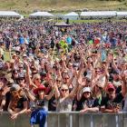 Fans begin to gather at the front of the stage for the final act of the day, Gin Wigmore, at the...