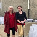 Taieri MP Ingrid Leary (left) and Volunteer South manager Leisa de Klerk help fill sandbags at...