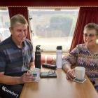 Relaxing in their caravan at Dunedin Holiday Park and Motels yesterday were Richard and April...