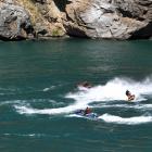 Jet-skiers play on Lake Dunstan recently. PHOTO: STEPHEN JAQUIERY