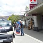 Skydive Wanaka pilot Hamish Brown and Business Development Manager Derek Melnick (right) remove a...