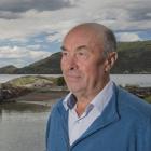 	Otakou kaumatua Edward Ellison stands at Wellers Rock on the Otago Peninsula, which is named...