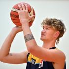 Otago Nuggets signing Akiva McBirney-Griffin gets in some practice at the Edgar Centre yesterday....
