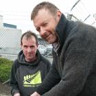 AG Proud volunteer Mark Patterson, of Lawrence, helps Silver Fern Farms beef slaughterman Nathan...