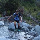 Eventual Coast to Coast winner Sam Clark (Whakatane) negotiates his way through Doreen Creek....