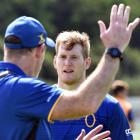 Otago lock Jack Regan listens to coach Tom Donnelly explain a lineout move at training at Logan...