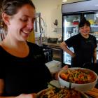 Head chef and cafe manager Louise Evans holds vegan salads at Horopito Cafe, Orokonui...