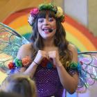 Rainbow Rosalind entertains children and their parents at a Christchurch earthquake fundraising...