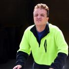 Dunedin resident Rorie White (28) is recovering after his enclosed scooter (inset) was knocked...