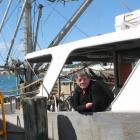 Oysterman John Edminstin prepares his fishing boat Polaris for the beginning of oyster season...