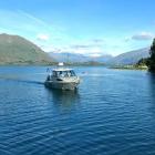 Niwa researchers on the water at Lake Wanaka in December 2019, using equipment to map sediments...