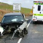 A Holden Commodore's engine block was torn off during an accident on State Highway 1 between...