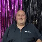 Mark Jackson is a supermarket worker and business operator by day, and a drag queen by night....