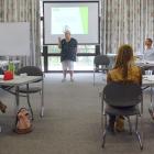 Shaping Our Future chairwoman  Vanessa Van Uden addresses participants in the forum at the Lake...