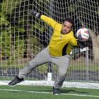 Al-Huda goal keeper Hassan Al-Saayed warms up for the Race Relations Week Tournament of the...