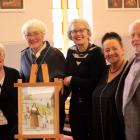 Celebrating the unveiling of a portrait of St Mary MacKillop at St Mary Star of the Sea church at...