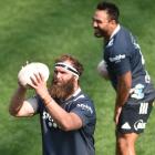 Practising his throwing in is hooker Liam Coltman while replacement hooker Ash Dixon watches...