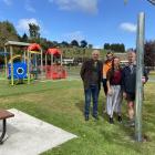 On hand as the first pole is installed for the new shade sail at Green Island playground on...