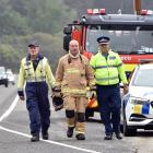 Waitati firefighter Andy Beecroft, senior firefighter Craig Meade, and Inspector Craig Brown are...