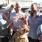 Toasting the Clyde Wine and Food Festival yesterday are (from left) Amy and Brad Mason, of...
