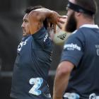 Highlanders co-captain Ash Dixon throws into the lineout watched by fellow rake Liam Coltman....