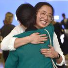 Sydney University student Isabella Lau (21) smiles as she embraces her mother, Dunedin...