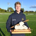 Sean Withy with the trophy he won for being the player of the tournament at the under-20...