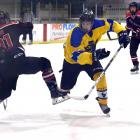 Southern player Connor Rolfe (centre) moves past Canterbury defender Harry Louw in a game at the...