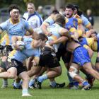Taieri prop Tom Hill evades the tackle of University’s Ricky Jackson during a premier game at...