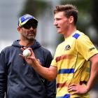 Otago Volts coach Rob Walter, seen here with Volts player Nathan Smith, is to continue in the...