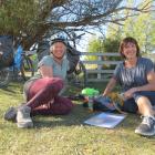 Making the most of the sunshine alongside the Otago Central Rail Trail at Chatto Creek are...