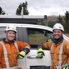 Electrix transmission and distribution line mechanics Scott Mulcahy (left) and Sean ‘‘Stewie’’...