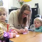 Rachael Devlin and her daughter Maeve (4), with Josie Coote (2), thinking about fun ideas for the...