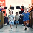 Big fans of Beethoven and running around churches (from left) Jimmy Burke (3), Oscar Muir (3) and...