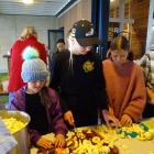 Chopping fruit for relish at the Wanaka Autumn Apple Drive at Rippon Hall on Saturday are (from...