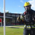 Volunteer firefighter Mark Basson trains for his world record attempt at running the fastest half...