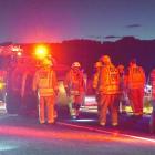 A car on its side on SH1 about halfway between Milton and Waihola at about 6.45pm tonight. PHOTO:...