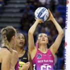 Steel shooter George Fisher looks to score watched by Pulse goalkeeper Kelera Nawai in an ANZ...