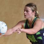 College A wing attack Abby Johnston looks to move the ball on against South Pacific Titans A at...