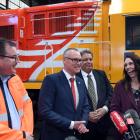Sharing a laugh during yesterday’s visit to Dunedin’s Hillside Workshops are (from left) Minister...