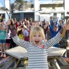 Macandrew Bay School pupil Abbie Wood (6) and her fellow junior pupils respond to news of the...
