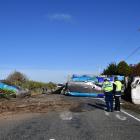 A milk tanker on its side after it crashed near Dacre, Southland. Photo: Laura Smith