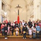 Some of St Joseph’s School’s 23 new pupils and their families gather at St Patrick's Basilica...