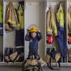 Hoping that he will one day grow into a firefighter’s outfit is Ray Wilson, of Mosgiel, at the...