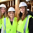 Della-May, Melissa and Lilly Vining (14) at the Southland Charity Hospital building yesterday....