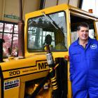 Thornbury Vintage Tractor and Implement Club president Fraser Pearce stands with Bert the tractor...