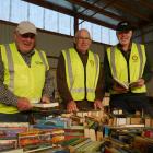At the Rotary Club of Taieri's book sale last week are (from left) club member Denis Aitken,...