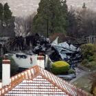 The remains of the clubhouse at Belleknowes Golf Club this morning after last night's blaze....