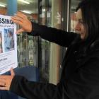 Chris Bates’ sister-in-law Sidonee Bates puts up a flyer on February 21, 2018. PHOTO: ODT FILES